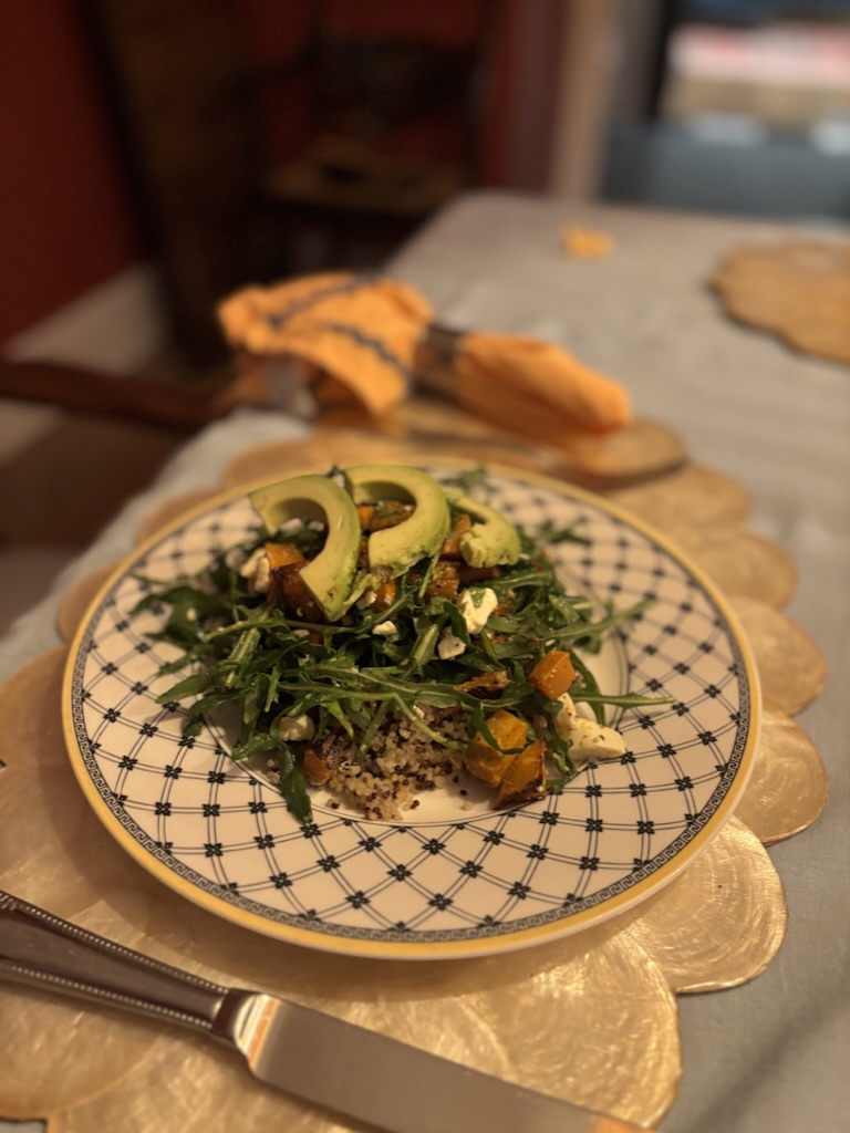 A garden salad plated on the family table